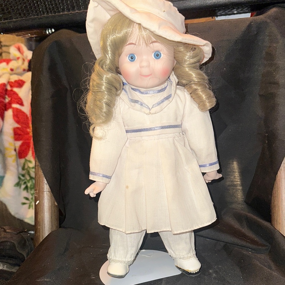 Source Unknown Cream Doll with Blue Eyes